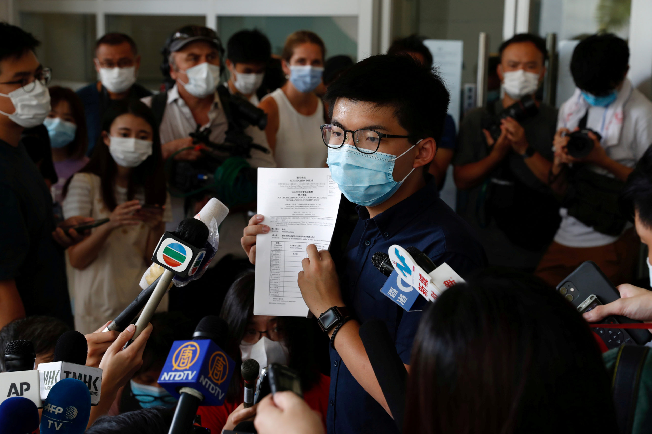 Hong Kong: Le militant Joshua Wong candidat aux législatives
